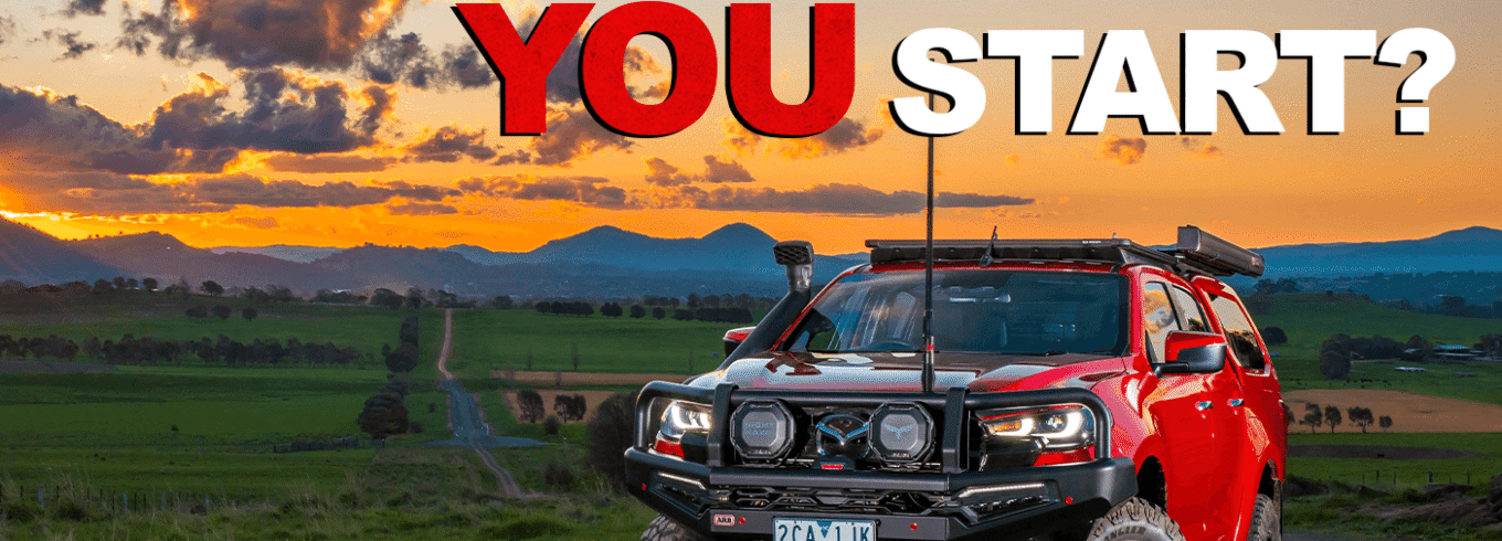 4WD touring vehicle fitted with a bull bar, suspension upgrades and roof rack setup