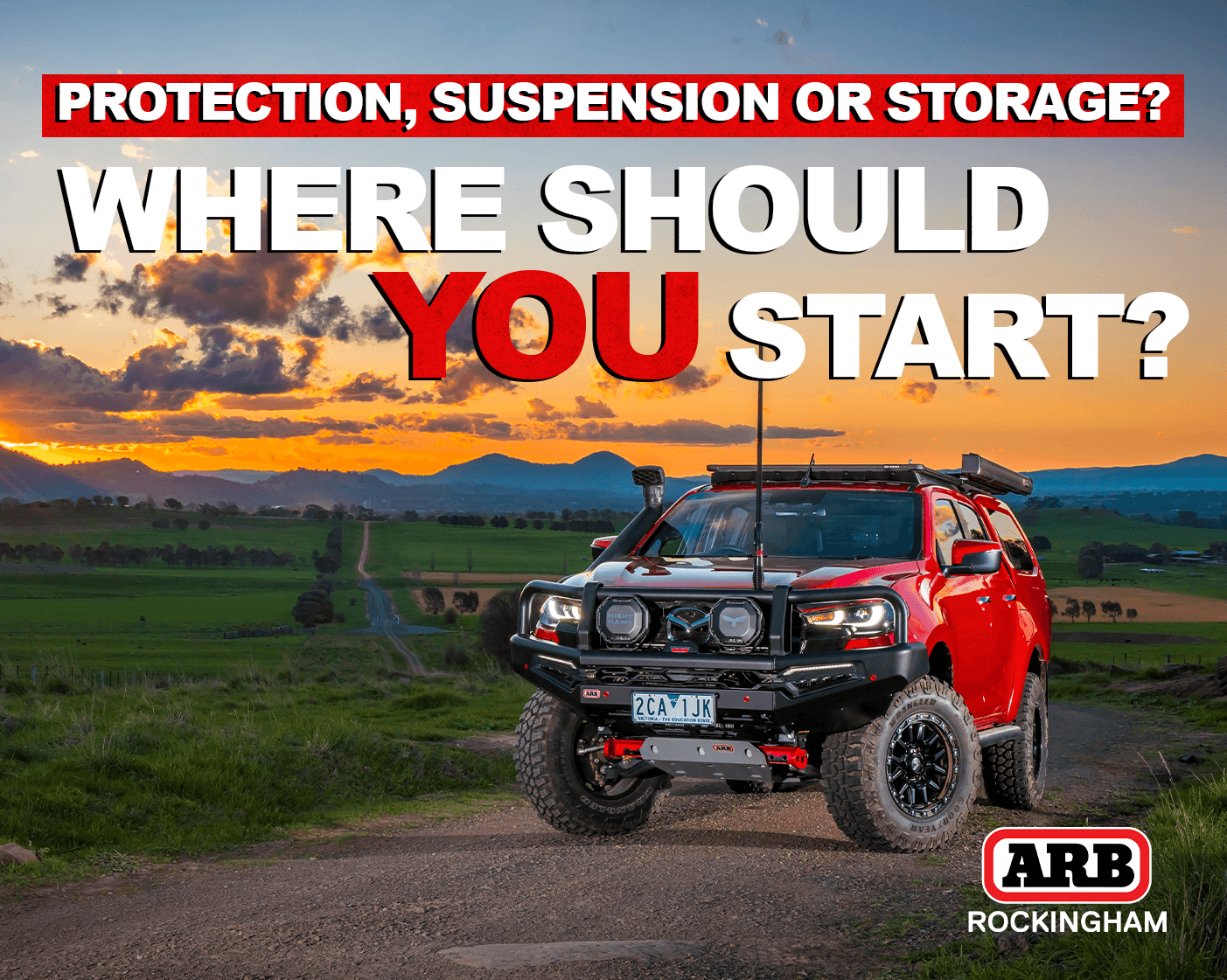 4WD touring vehicle fitted with a bull bar, suspension upgrades and roof rack setup