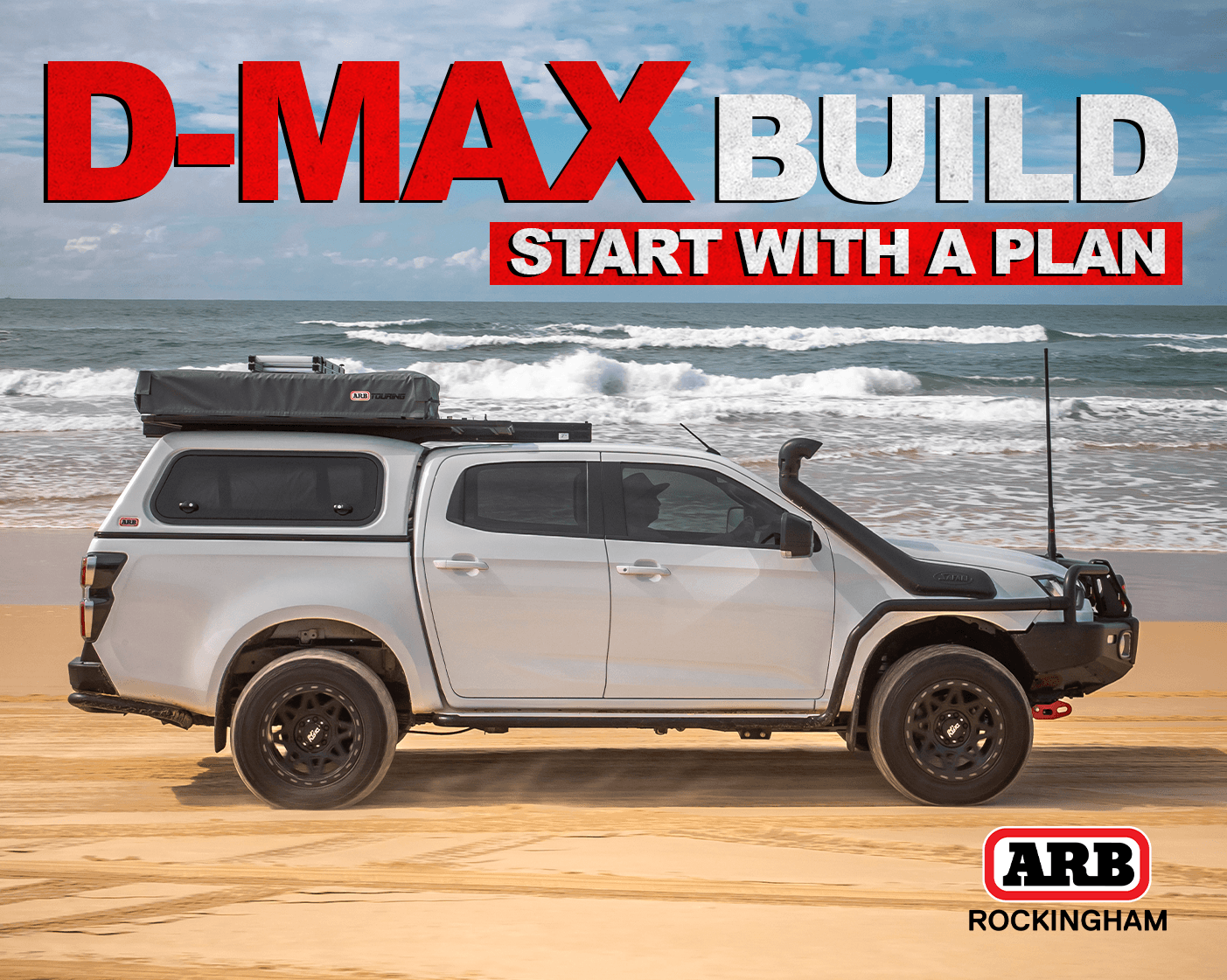 Isuzu D-MAX driving along a beach during a touring and remote travel adventure