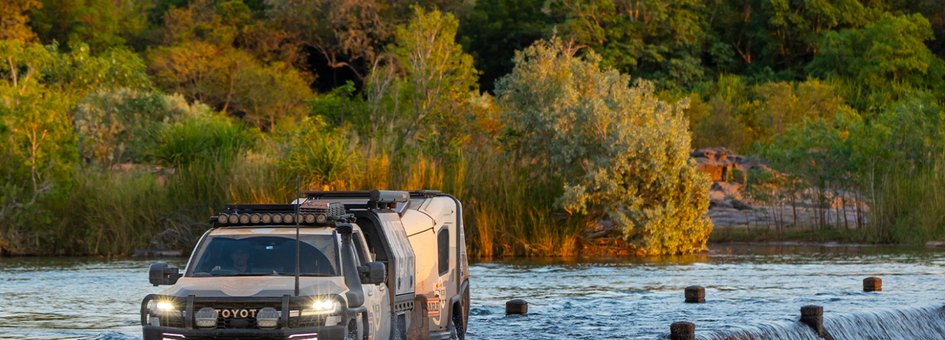 4WD touring vehicle driving through the Kimberley during the WA dry season