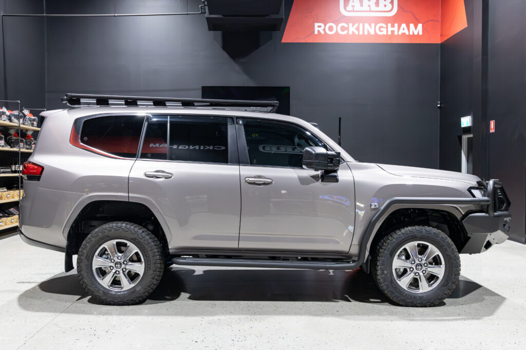 Side profile of Rick's Toyota LandCruiser 300 Series touring build with ARB Summit MKII Bull Bar, Base Rack and Old Man Emu MT-64 suspension.