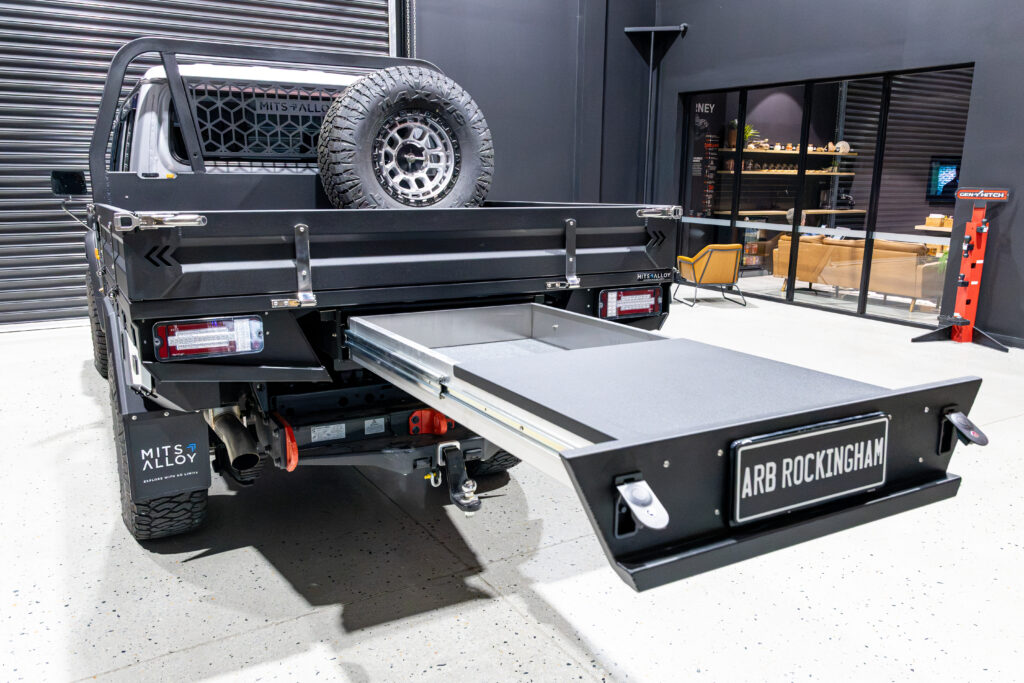 Rear trundle drawer extended from a MITS Alloy tray fitted to a Toyota LandCruiser 79 Series.