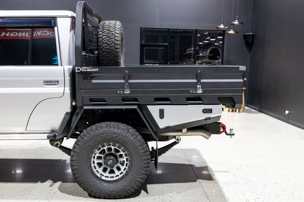 Passenger side view of a Toyota LandCruiser 79 Series displaying the MITS Alloy tray and colour coded undertray toolbox.