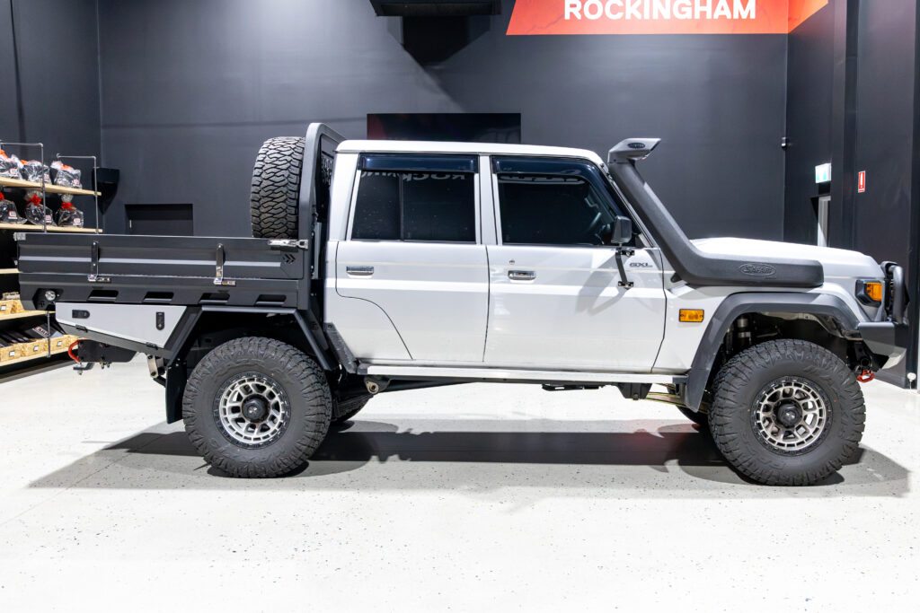 Full side view of a Toyota LandCruiser 79 Series fitted with a MITS Alloy tray and ARB accessories.