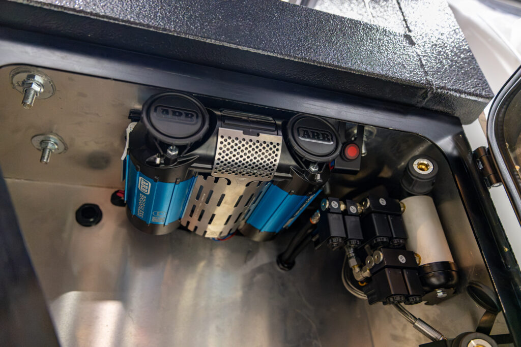 ARB twin brushless air compressor installed inside the RAM 2500 toolbox
