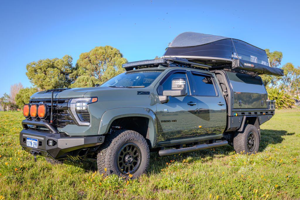Chevrolet Silverado 2500 touring build featuring a MITS Alloy tray and canopy, Redarc electrical system, Bushranger accessories and premium touring upgrades by ARB Rockingham.