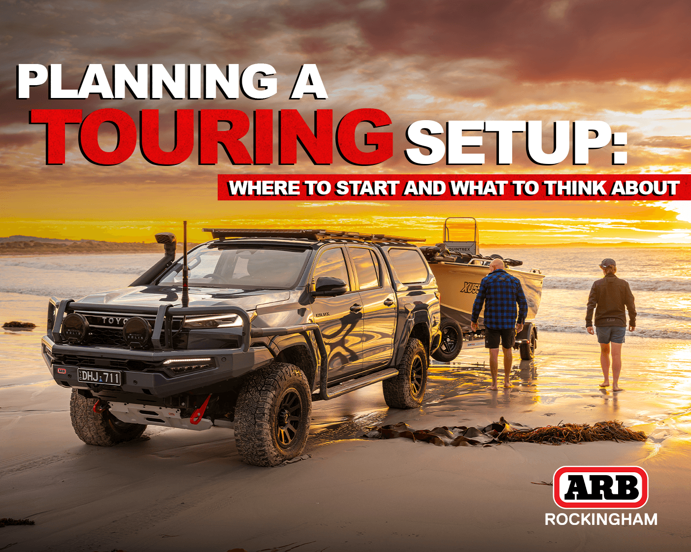 Toyota Hilux touring setup parked on a WA beach ready for camping and boating