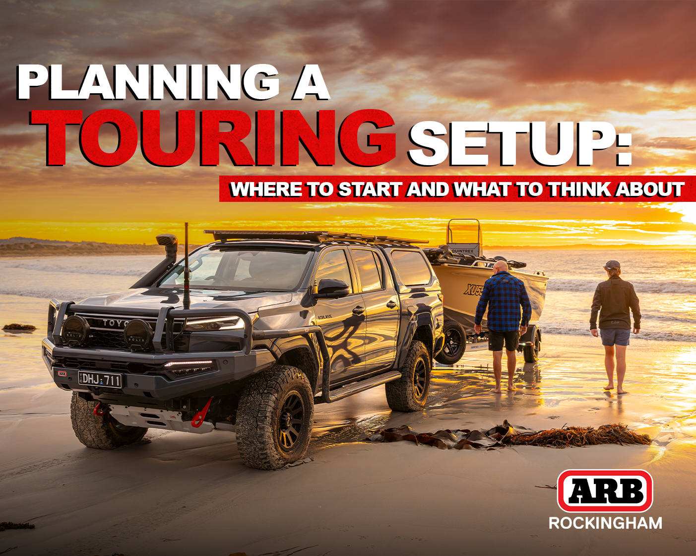 Toyota Hilux touring setup parked on a WA beach ready for camping and boating