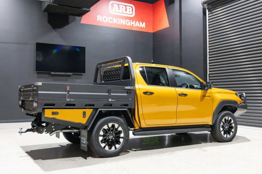 Rear three quarter view of an N90 Toyota HiLux with a MITS Alloy tray, sideboards and undertray toolboxes