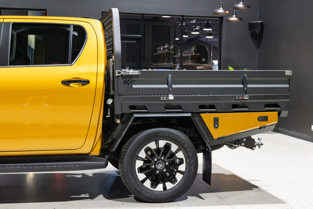 Colour coded MITS Alloy undertray toolbox and full length sideboard fitted to an N90 Toyota HiLux