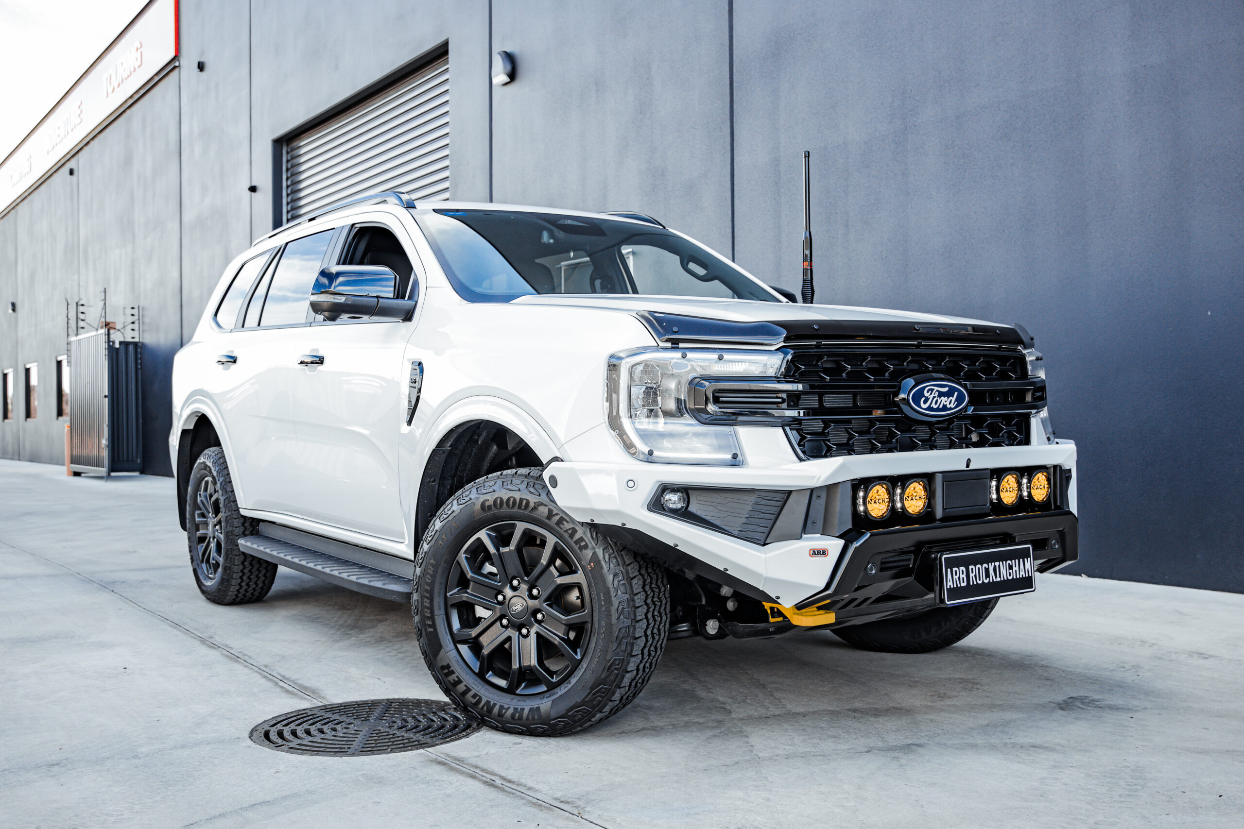 White Ford Everest fitted with a colour coded ARB Zenith Bull Bar and ARB Nacho lights at ARB Rockingham