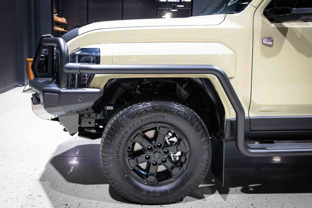 Kia Tasman fitted with ARB side rails and steps as part of a complete 4WD setup