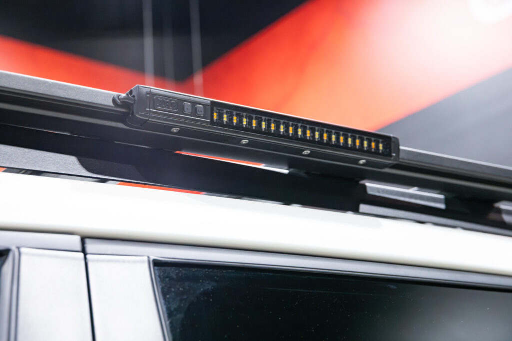 ARB auxiliary rear light mounted to the Base Rack on Tania’s chopped Toyota LC300