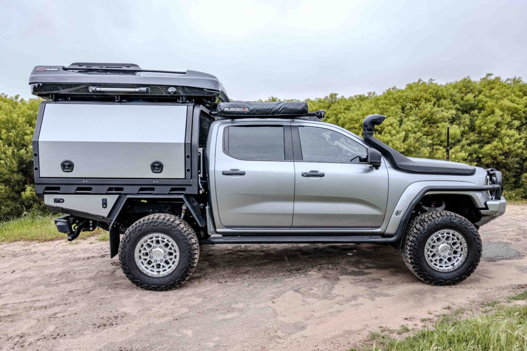 Side profile of a Ford Super Duty fitted with a MITS Alloy tray and canopy, ARB protection and touring accessories