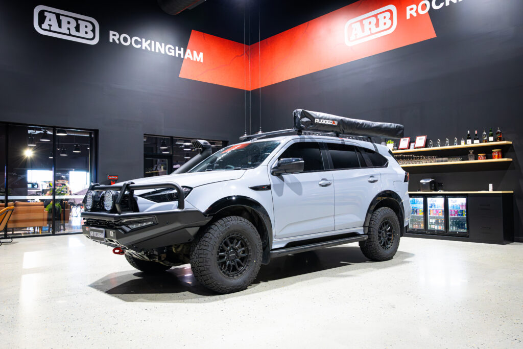 Front three-quarter view of Liam’s Isuzu MU-X with ARB Summit MKII Bull Bar, Night Hawk driving lights and Safari ARMAX snorkel
