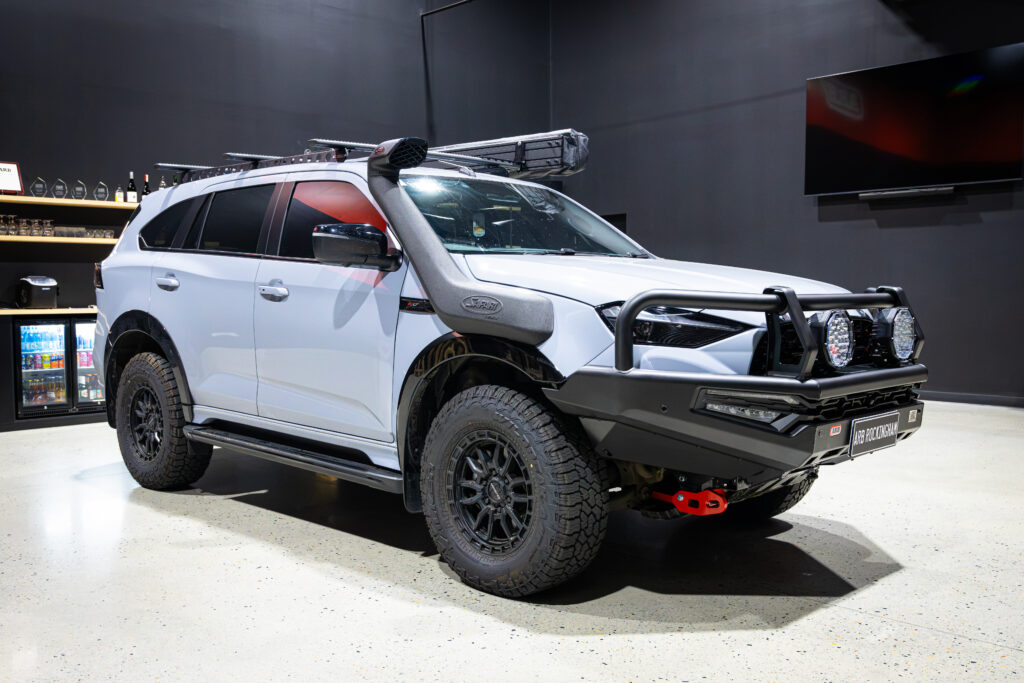 Liam’s Isuzu MU-X fitted with ARB protection, Bushranger driving lights, Safari snorkel and Rhino-Rack roof setup at ARB Rockingham